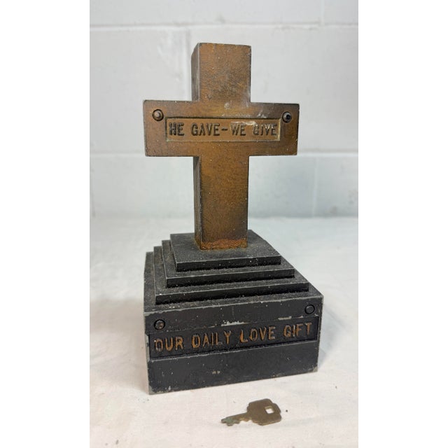 Up for sale is an exquisite vintage painted metal religious crucifix still bank. Made in the United States, this cross is...
