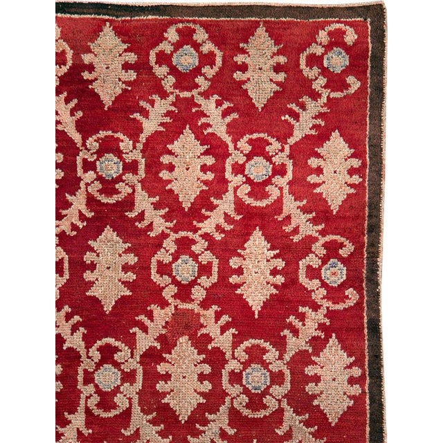 This mid-20th-century Turkish Anatolian accent rug presents a vibrant allover botanical lattice across a saturated...