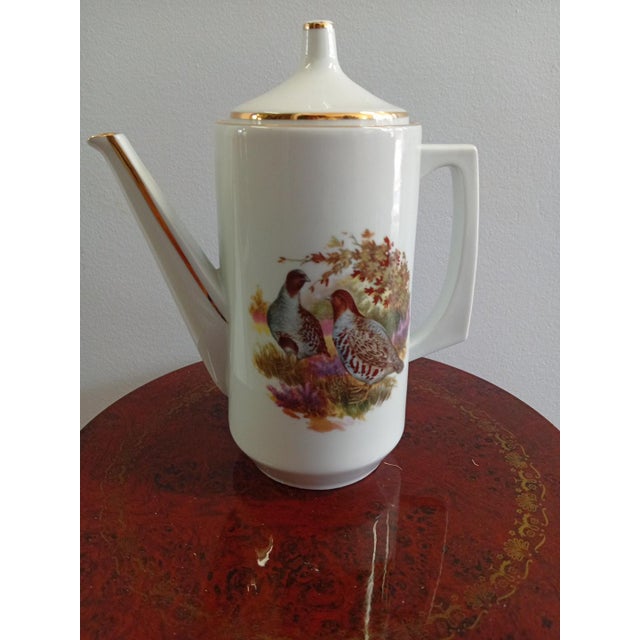 French Porcelain Coffee Pot with Hunting Scene Decoration and Gilding from PF, France, 1950s, in Flawless conditions....