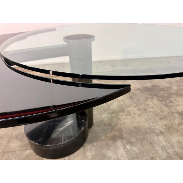 Postmodern “Moon” extendable dining table designed by Mario Mazzer for Zanette, Italy. The sculptural design features a...