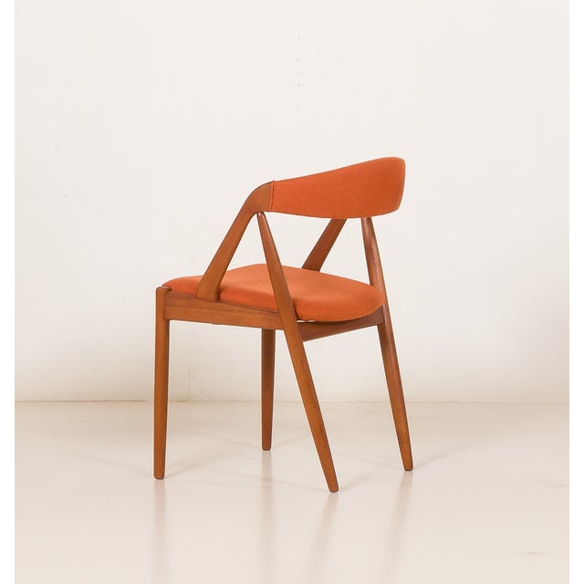 This original teak chair was designed in the 1960s for schou andersen and exemplifies the craftsmanship of danish mid-...
