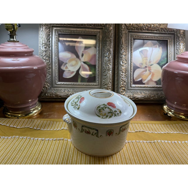 Beautiful vintage Louis Lourioux fireproof porcelain covered casserole dish from France, featuring the Le Faune (also...