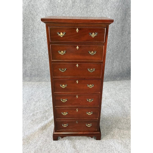 This vintage Craftique seven-drawer lingerie chest is crafted in rich mahogany and features classic brass hardware,...