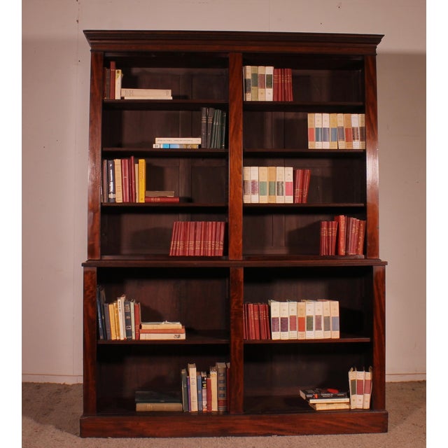 Elegant and rare large open mahogany bookcase from the 18th century English Georgian period. A very beautiful and uncommon...