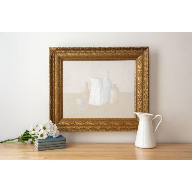 Abstract still life painting on canvas in a carved antique frame. This original piece has a faded, neutral palette with...