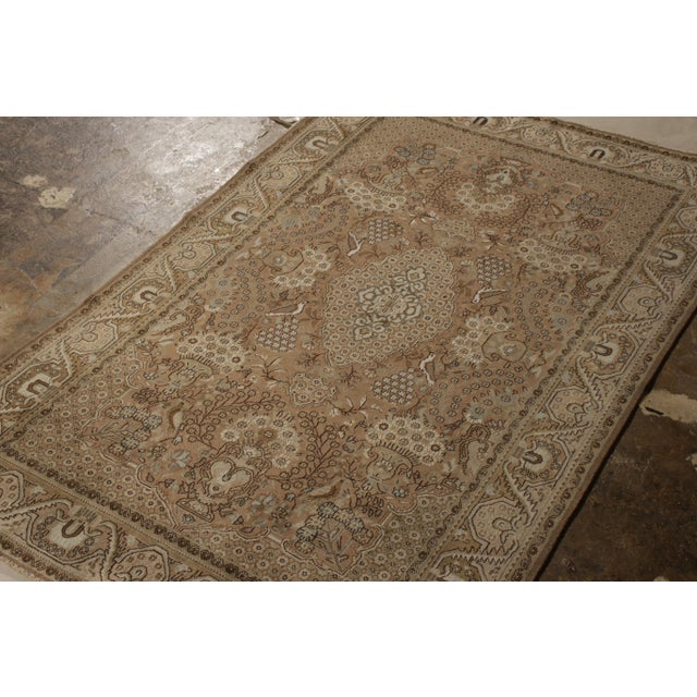 Hand knotted in wool circa 1950-1960, this vintage 5x8 Persian Qum rug joins Rug & Kilim’s coveted Vintage and Vintage...