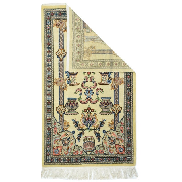 Indian Rug 3'4'' x 5'8''. In a semi-pictorial style with two Achaemenid-style warriors supporting a tabernacle, above...