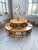 Set consisting of a round pine table and its other rounded pine benches, which adapt perfectly to the table. from the...