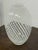 Design Plus Gallery presents a White Spiral or Whirling Vase. The vase has these concentric lines that spiral all around...