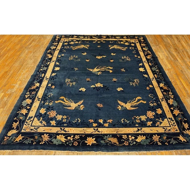 Rectangle Chinese - Peking Knotted Room Size Blue Wool Antique 1920s Rug, Circa Date: 1920s. This magnificent example of...