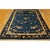 Rectangle Chinese - Peking Knotted Room Size Blue Wool Antique 1920s Rug, Circa Date: 1920s. This magnificent example of...
