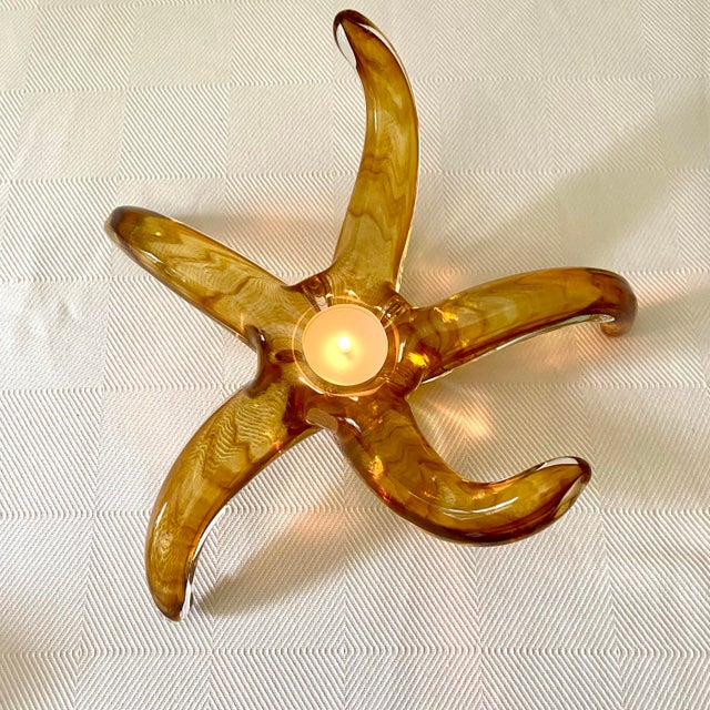 From the Waterford Crystal Evolution Ocean Motif collection. This beautiful, golden amber vintage glass sculpture was...