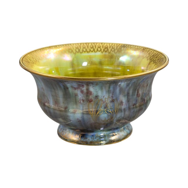 A rare fairyland lustre bowl designed by daisy makeig-jones for wedgwood around 1915. Pattern z4828 is distinguished by...