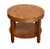 A fine French occasional or low side table from the Art Deco period, featuring a circular top with a striking pie-cut...