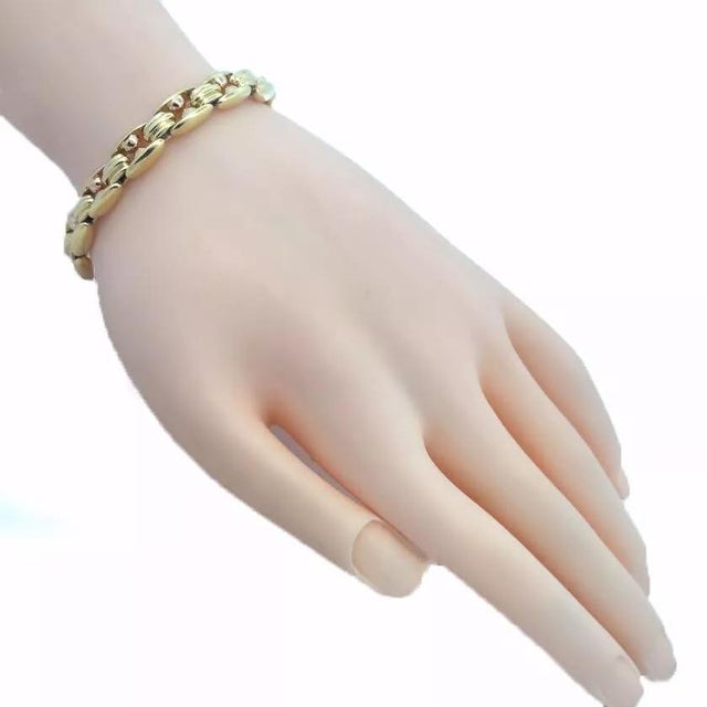 Authentic and elegant by Bvlgari, this bracelet is crafted from 18k yellow and rose gold featuring open style links with...