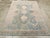 This mid-20th-century Persian Afshar accent rug presents a softly geometric composition in muted blue, pale peach, ivory,...