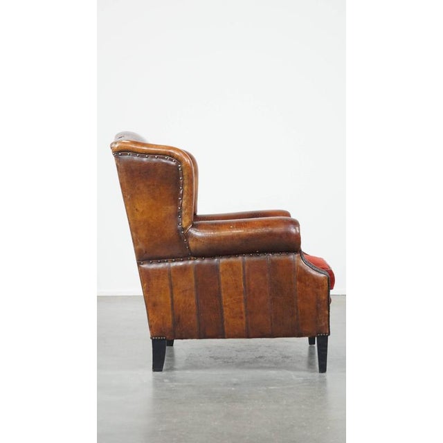 Vintage Leather Wing Chair with Red Corduroy Seat Cushion For Sale - Image 3 of 14