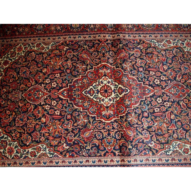 Handmade antique Kashan rug in traditional floral design. The rug is in original good condition from the beginning of 20th...