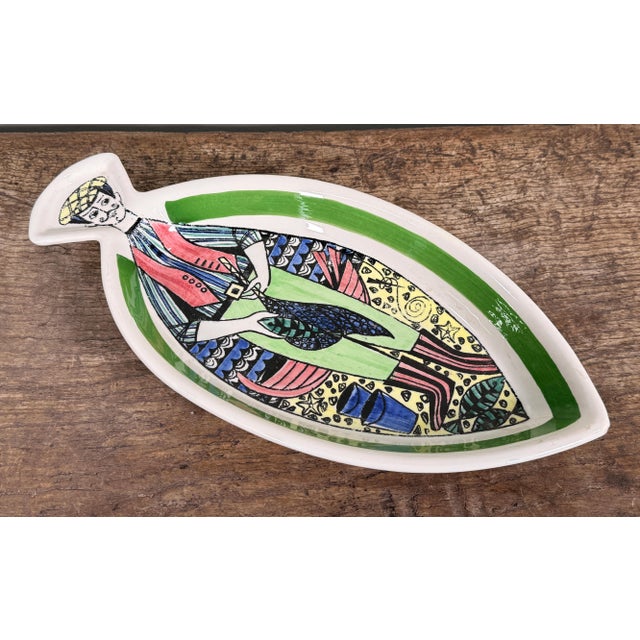 This 1950s Scandinavian Modern ceramic platter from the “Janssons Frestelse” (Jansson’s Temptation) series was designed by...