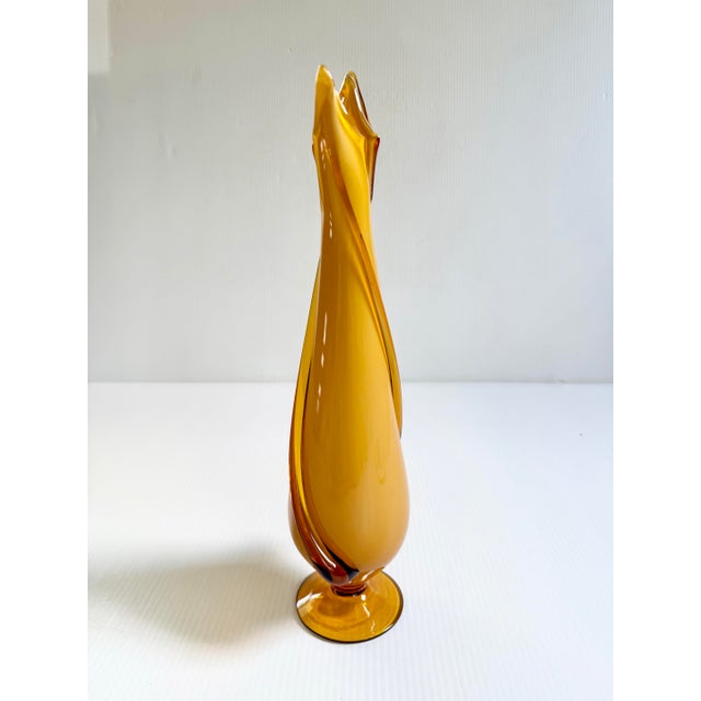 Mid Century footed swung glass vase attributed to Cristalleria Fratelli Betti. Unique and striking design.