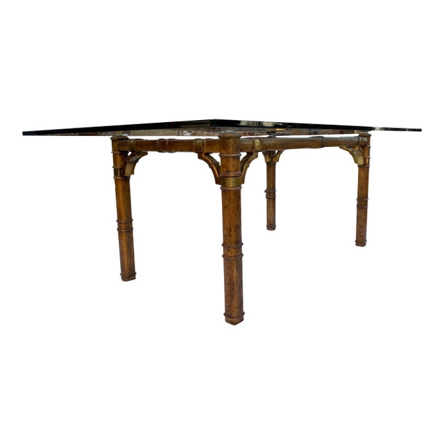 Asian inspired Chinese Chippendale style dining table seats eight, featuring faux timber carved hardwood base, with gilt...