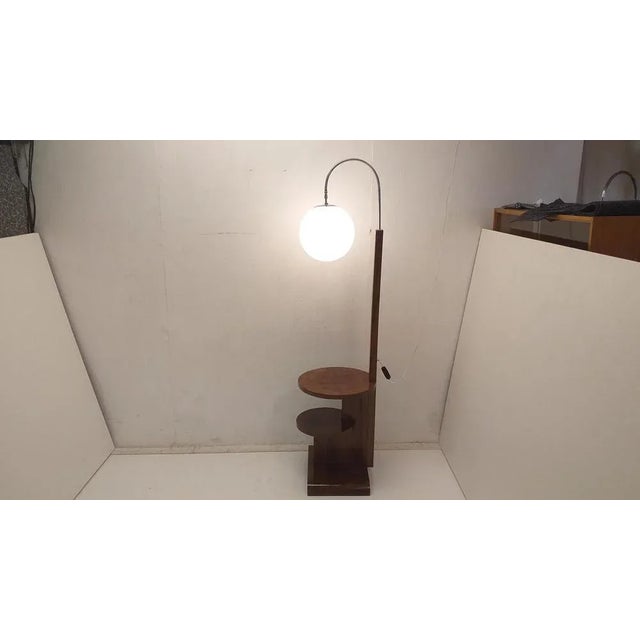 - Wooden veneered lamp (walnut veneer) - period functionalism - manufactured by U.P. Závody Czechoslovakia - Preserved and...