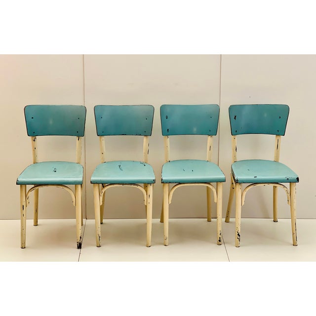 Dining Chairs by Ton, 1960s, Set of 4, in Very Good conditions. Designed 1960 to 1969 This piece has an attribution mark,...
