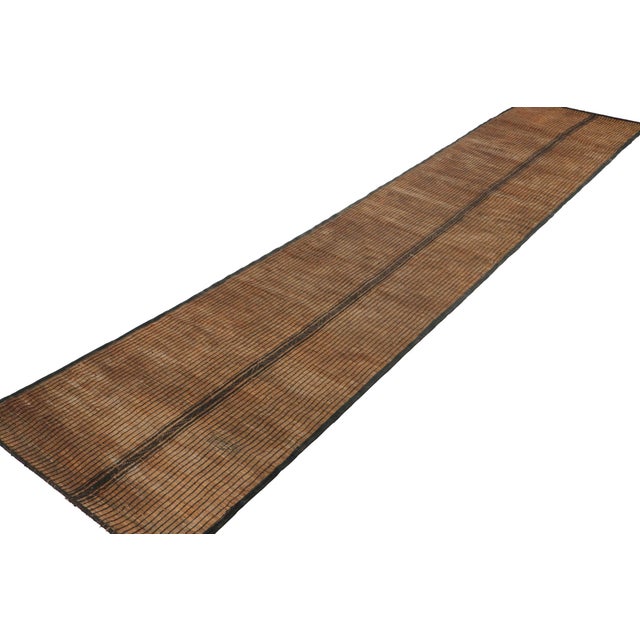 This vintage runner rug and floor covering is a 3x15 Tuareg mat from the nomadic tribe of the same name. Handwoven with...