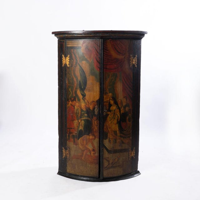 Wonderfully designed 18th century painted hanging corner cupboard with butterfly hinges. This piece shows the intent and...