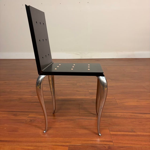 A rare and collectible Lola Mundo chair designed by Philippe Starck for Driade in 1988, a model represented in the...