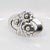 A fine Georg Jensen sterling silver pin or brooch. Model no. 28. Designed by Georg Jensen. In the form of a hand-hammered,...