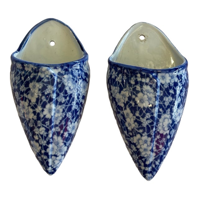 Pair of Blue and White Glazed Ceramic Floral Wall Pockets For Sale