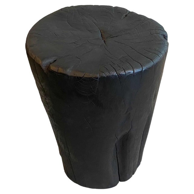Reclaimed teak wood side table or stool. Hand carved into a drum shape whilst respecting the natural organic wood....