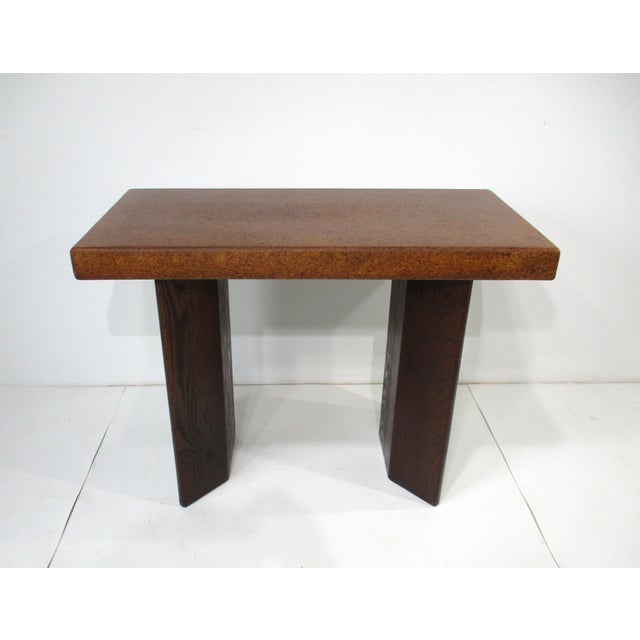 A rare exceptional cork top console table with angled wooden bases by designer Paul Frankl, his superb pieces many using...
