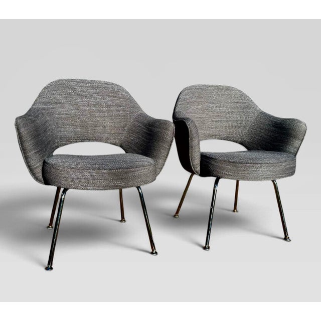A pair of Eero Saarinen Executive Armchairs, custom ordered from Design Within Reach in 2019 and manufactured by Knoll....