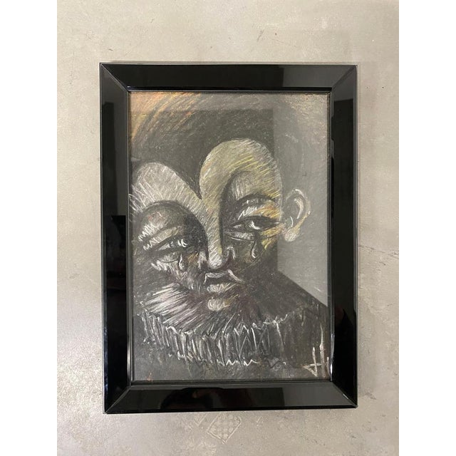 Crying clown with a collar The picture shows a crying clown with a collar. The author of the work is Juraj Huliak a very...