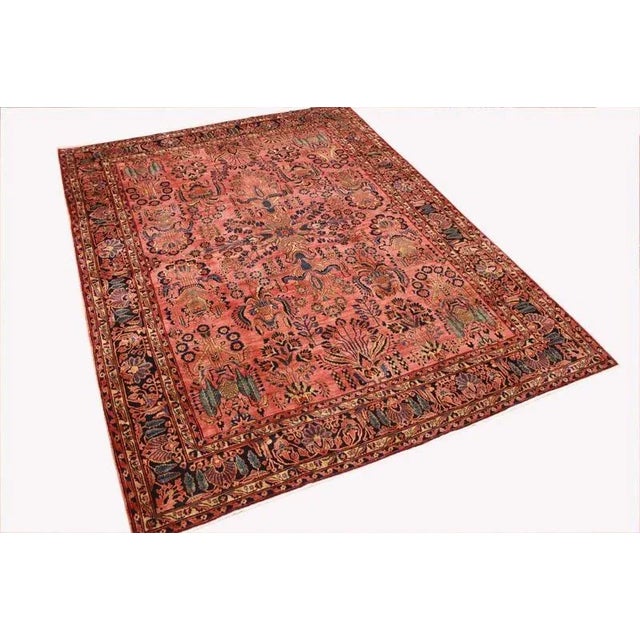 Antique Persian Sarouk rug | Knot density: 400.000 knots/m² | Pattern: Colorful leaf and floral motifs | Material: High-...