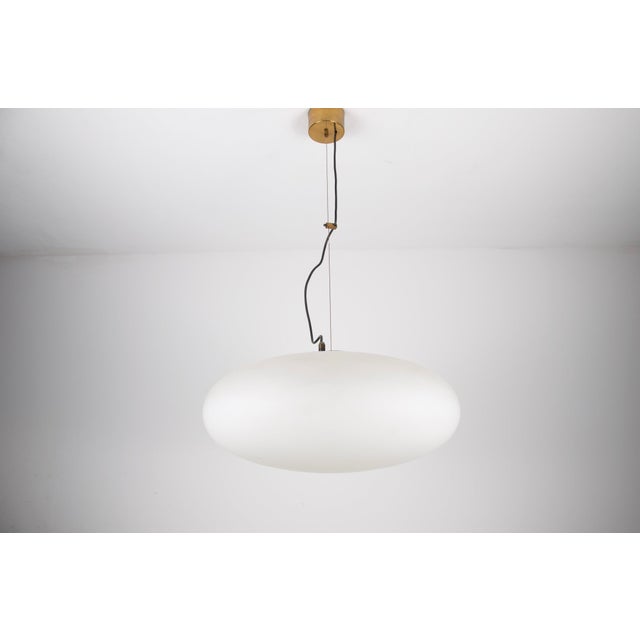 This mid-century modern ceiling lamp from the renowned italian manufacturer stilnovo, dating back to the 1950s, is a...