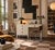This desk brings clean, architectural lines to industrial design — a streamlined steel case finished in warm ivory, with...