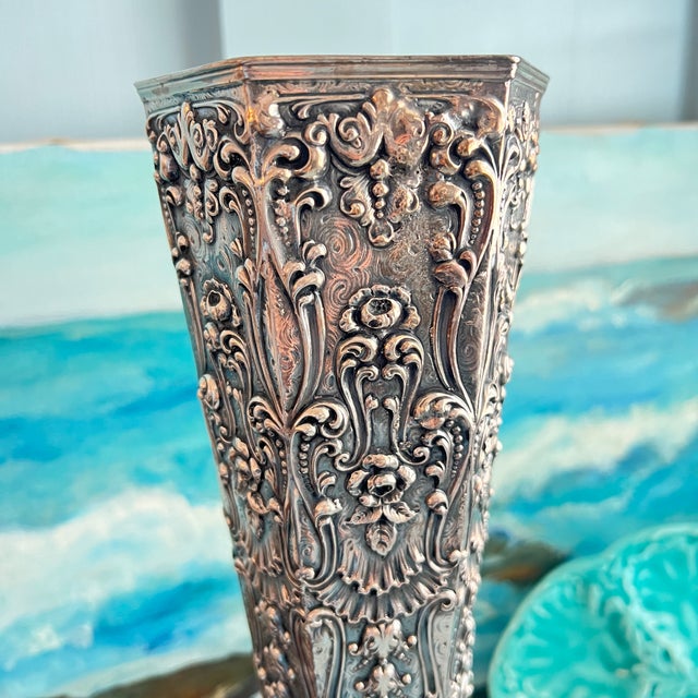 Elevate your home decor with the Vintage Large Repousse Trumpet Vase by Barbour Silver Co., a true masterpiece of...
