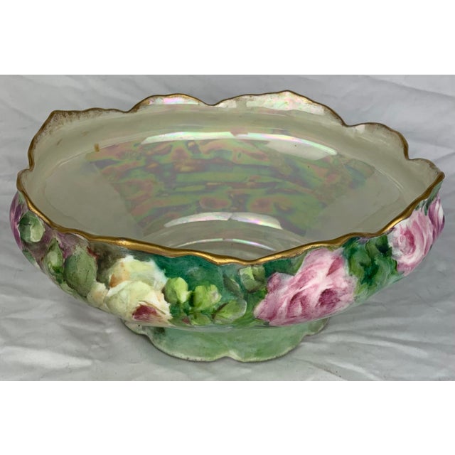 Antique Iridescent Bowl with hand painted flowers and gold rim.