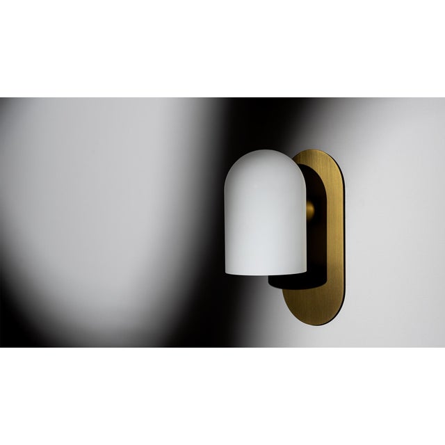 Serenely emitting light, while projecting its form. The distinctive Odyssey globe is reflected in this fixture by a...
