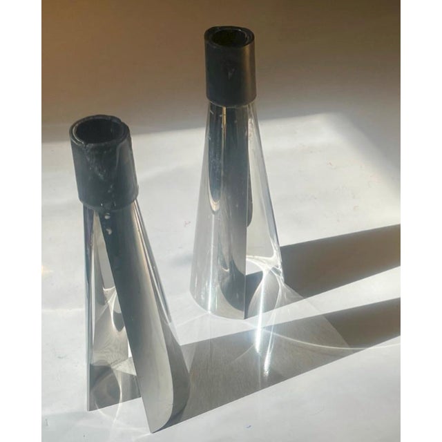 A truly iconic and collectible pair of candlestick holders by the celebrated Dutch designer Bruno Ninaber van Eyben....