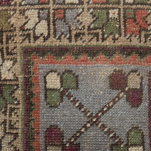 Add a touch of history and warmth to your space with this vintage handmade Turkish wool rug cushion cover. Crafted from...