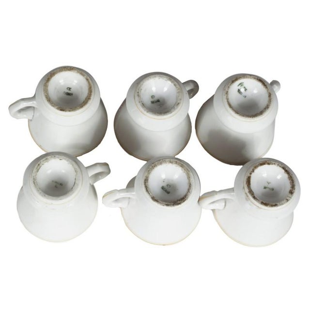 with 6 cups and 6 saucers the brand name is printed on the bottom. Measurements of the cup 7.5 cm diameter x H 8 Measures...