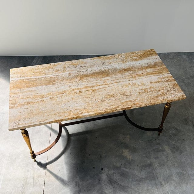 Width: 100 centimeters height: 43 centimeters depth: 50 centimeters a refined and timeless 1970s coffee table featuring a...