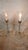 Elegant and complete matching pair of vintage mid-century Hollywood Regency style electric crystal hurricane lamps. Often...