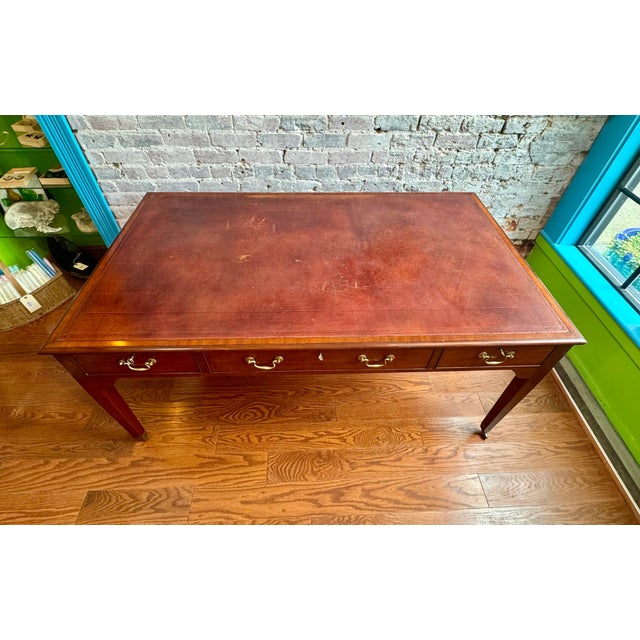 This beautiful piece is a replica of Winston Churchillâ€™s George III style partnerâ€™s desk, 20th century, large mahogany...