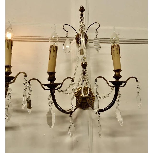 A Magnificent Pair of French Wall Chandeliers This is a superb pair of twin sconce wall lights, the lights are made in...