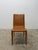 Single saddle leather dining chair designed by G. &amp; R. Fauciglietti for Frag, Italy. The color most closely matches...